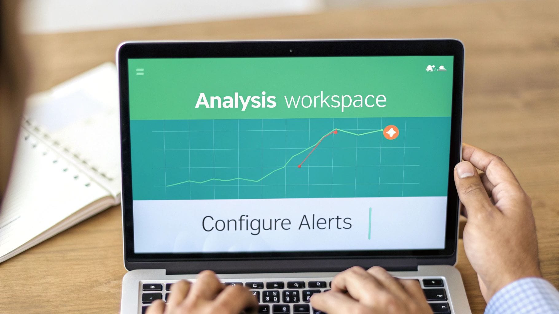 Person analyzing data on a laptop screen displaying an 'Analysis workspace' with a graph and 'Configure Alerts'.